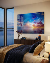 Landscape glass wall art displayed above a dark wood console in a navy-walled bedroom with bronze telescope and lakeview window