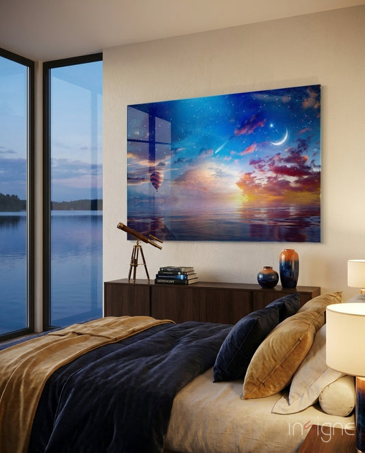 Landscape glass wall art displayed above a dark wood console in a navy-walled bedroom with bronze telescope and lakeview window