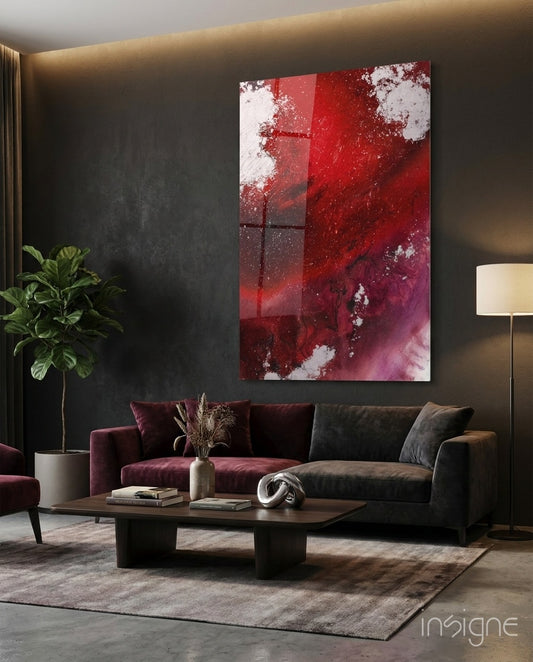 Colors of Abstraction glass wall art displayed above a wine-and-charcoal sectional in a moody dark-walled lounge with reclaimed wood coffee table