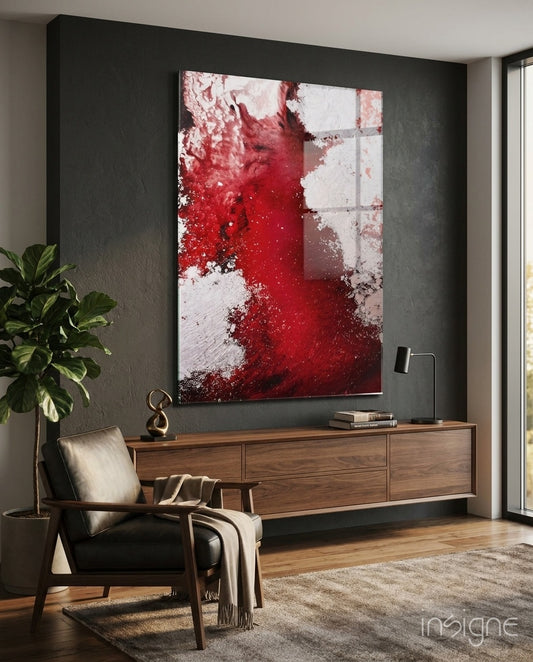Colors of Abstraction glass wall art displayed above a walnut credenza in a moody charcoal-walled lounge with leather armchair and fiddle leaf fig