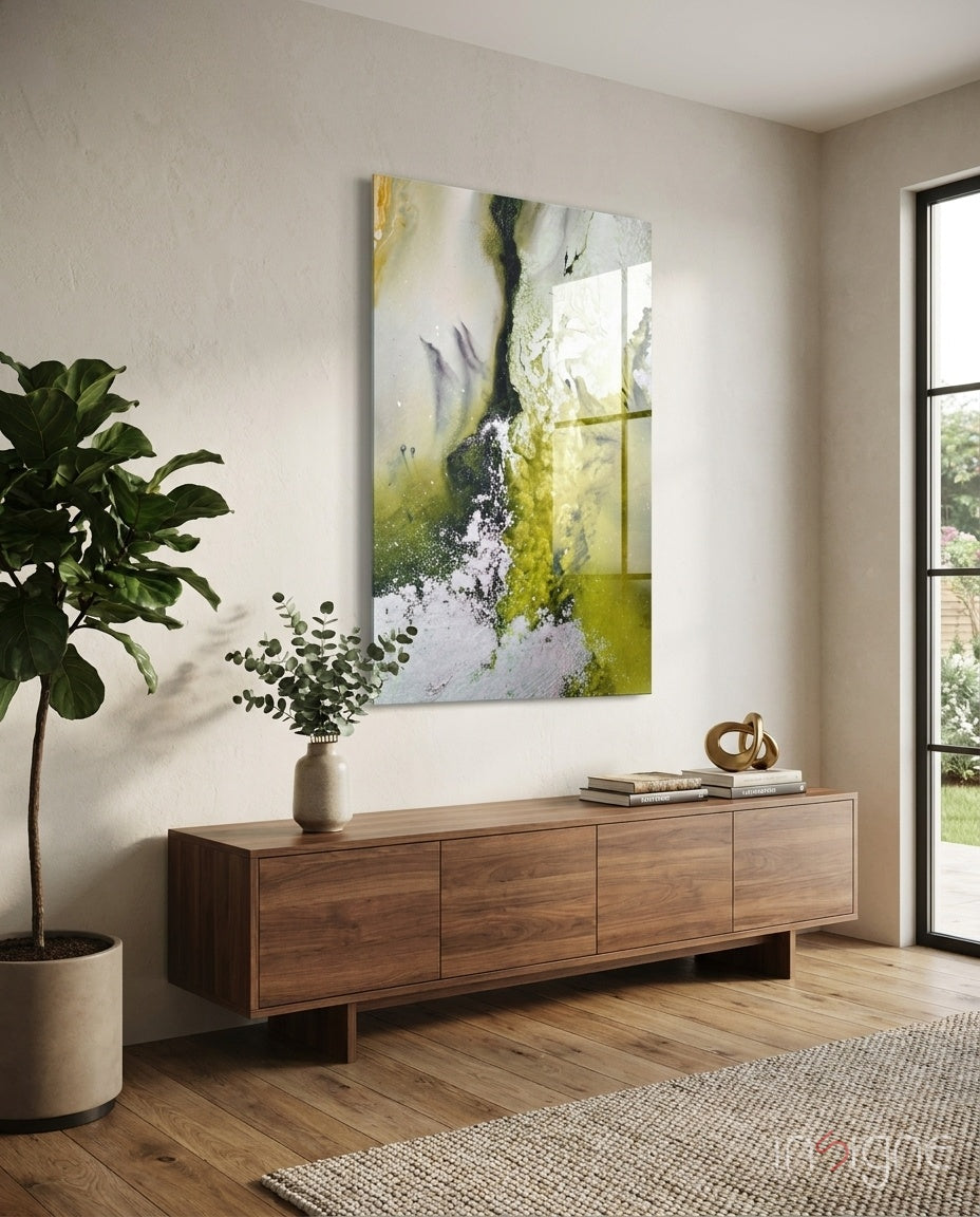 Colors of Abstraction glass wall art displayed above a walnut credenza in a soft white-plaster hallway with fiddle leaf fig and stoneware vase