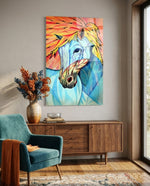 Horse glass wall art displayed above a walnut credenza in a soft taupe-walled lounge with teal velvet armchair and dried botanicals
