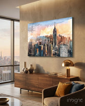 New York City glass wall art displayed above a walnut credenza in a soft sand-plaster lounge with linen sofa and brass dome lamp