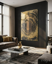 Abstract Loop glass wall art displayed above a brown velvet sofa in a moody charcoal-walled lounge with marble coffee table and gold sculptural objet