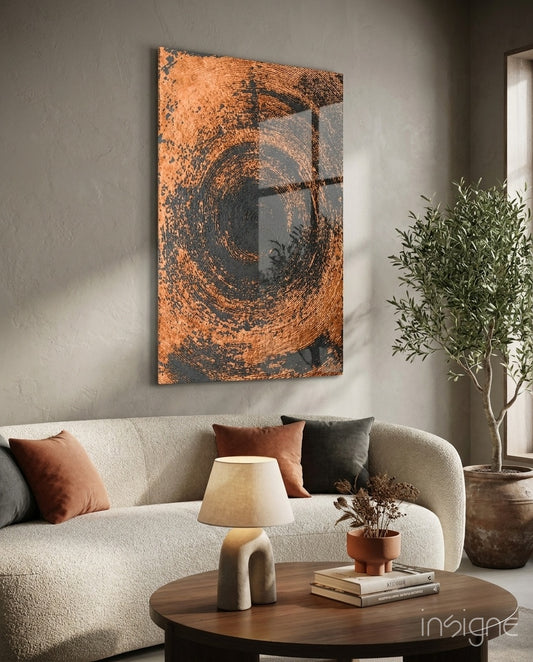 Abstract Loop glass wall art displayed above a bouclé sofa in a soft sand-plaster lounge with rust velvet pillows and olive tree