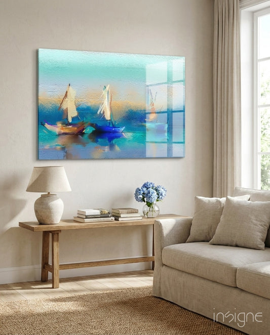 Sailboat glass wall art displayed above a wood console in a soft cream-plaster lounge with linen sofa and hydrangea arrangement