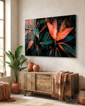 Flower glass wall art displayed above a reclaimed wood console in a soft sand-plaster lounge with terracotta pots and traveler palm