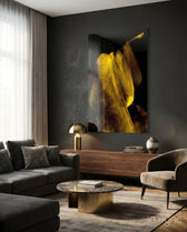 Yellow Story glass wall art displayed above a walnut credenza in a moody charcoal-walled lounge with cream sectional and brass dome lamp