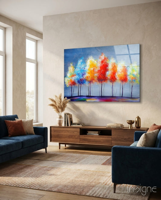 Drawing Trees glass wall art displayed above a walnut credenza in a soft cream-plaster lounge with two navy velvet sofas and warm rug