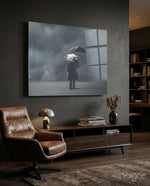 Storm in Thoughts glass wall art displayed above a walnut TV console in a moody charcoal-walled study with cognac swivel chair and bookcase