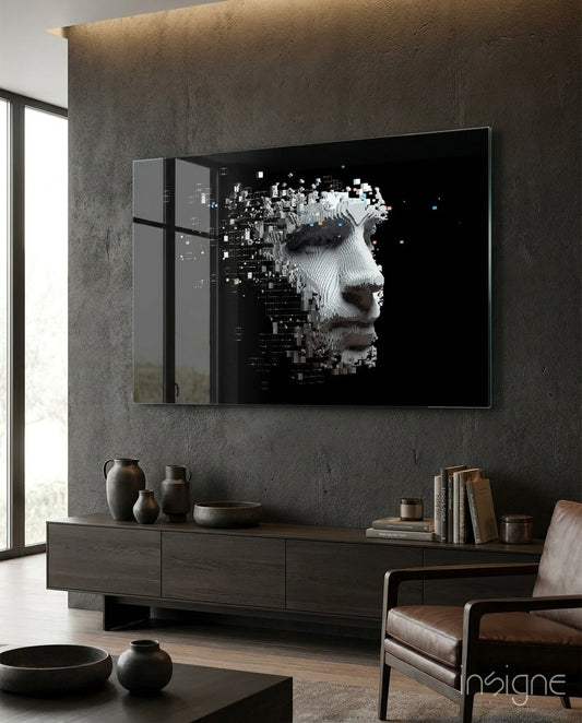 Being Human glass wall art displayed above a dark wood credenza in a moody concrete-walled lounge with leather armchair and stoneware vases