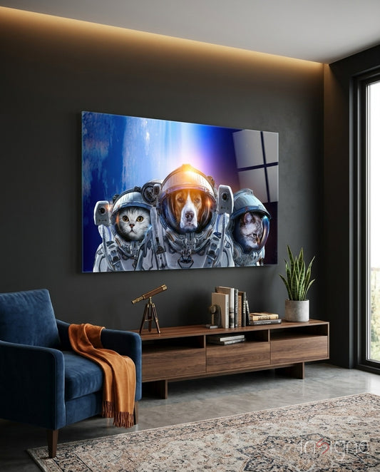 Space Team glass wall art displayed above a walnut credenza in a charcoal-walled lounge with navy velvet armchair and brass telescope