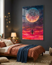 Freedom glass wall art displayed beside a wood platform bed in a charcoal-walled bedroom with rust linen bedding and star fairy lights