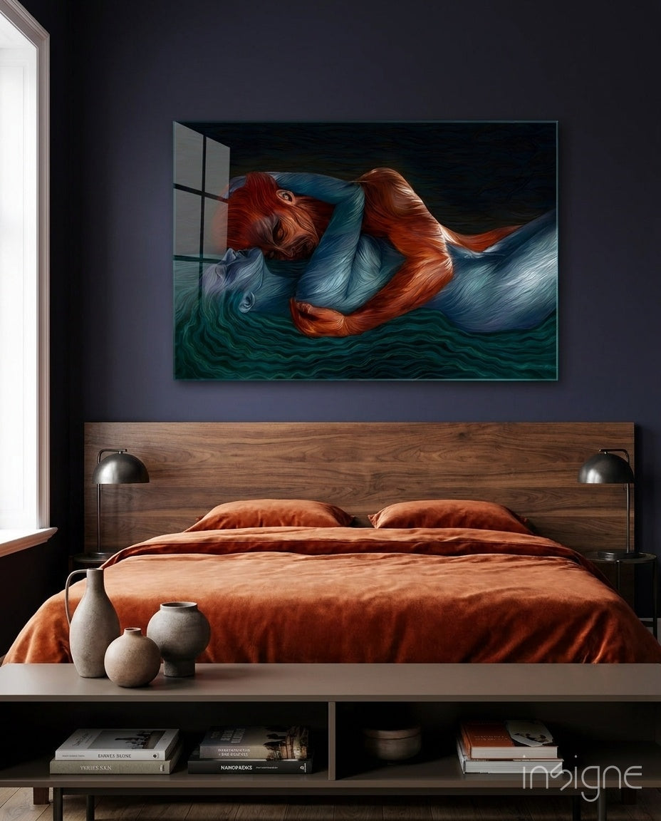 Water and Fire glass wall art displayed above a walnut bed in a navy-walled bedroom with rust velvet bedding and stoneware vases