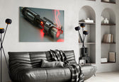 Light Saber glass wall art styled above a console in a gaming room