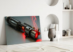 Light Saber close-up showing blackened hilt with crimson plasma curling from vent