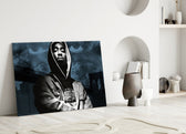 Tupac Shakur close-up showing hooded denim figure before Brooklyn Bridge silhouette