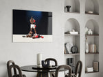 Muhammad Ali glass wall art styled above a bench in a home gym