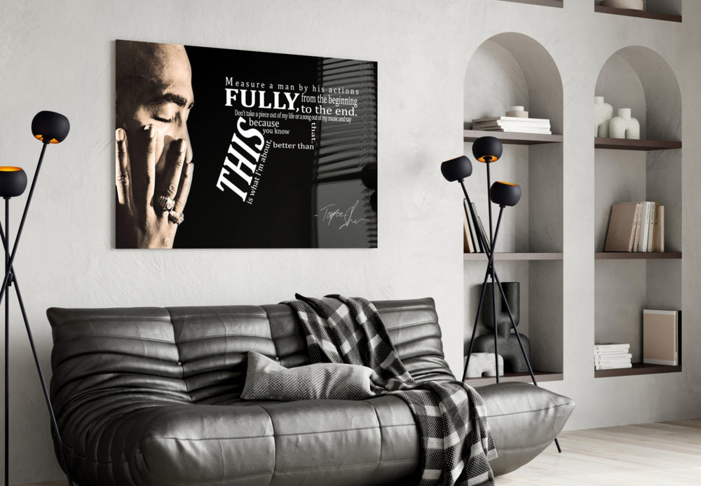 Tupac glass wall art styled above a console in a hallway