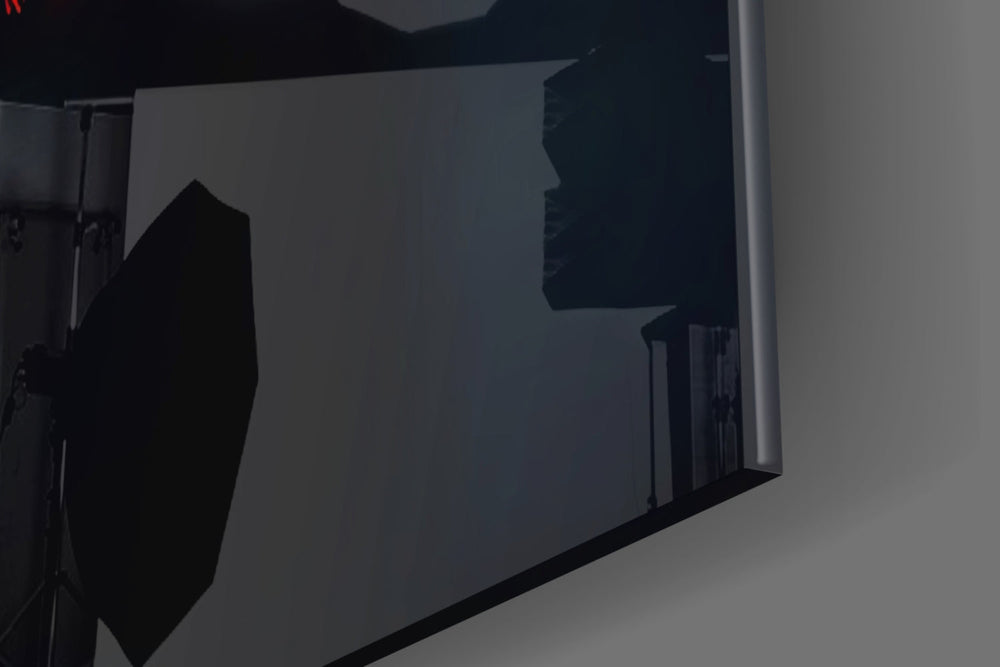 Joker artwork anchoring a wall with moody dramatic palette