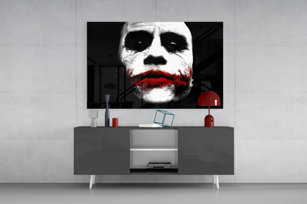Joker panel catching directional light to reveal its menacing gravity