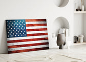 Flag of the United States close-up showing stars and stripes on cracked plaster