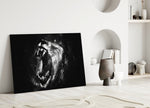 Lion close-up showing roaring monochrome king amid drifting smoke
