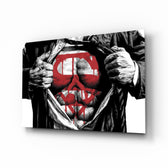Superman glass wall art displayed above a leather chesterfield in a moody man cave with reclaimed-wood console and brass arc lamp
