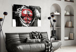Superman glass wall art styled above a desk in a kids room