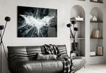 Batman and Gotham City glass wall art styled above a console in a gaming room