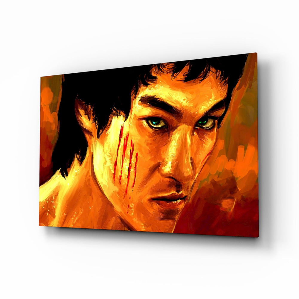 Bruce Lee glass wall art displayed above a leather chesterfield in a moody man cave with reclaimed-wood console and brass arc lamp