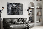 Batman, Catwomen and Bane glass wall art styled above a console in a gaming room
