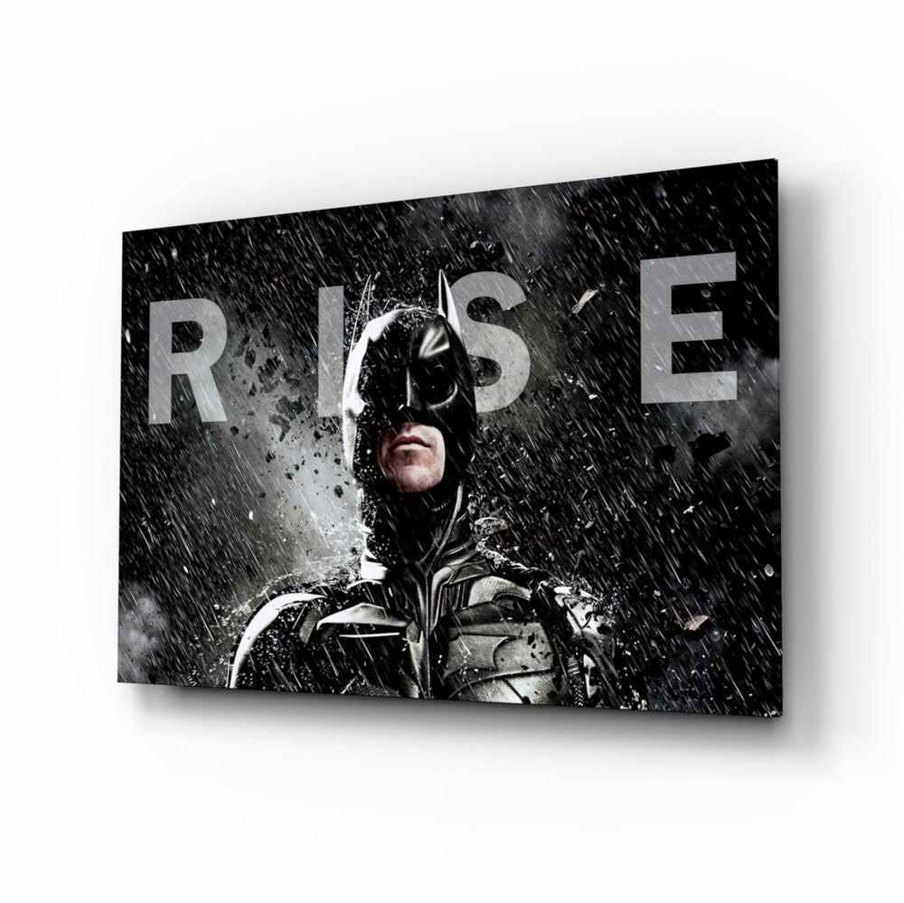 Batman Rise glass wall art displayed above a black leather sectional in a moody home theater with brass arc lamp and reclaimed-wood console