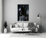Batman close-up showing Dark Knight cowl in painterly profile through falling rain
