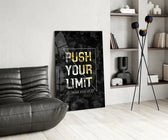 Push Your Limit gold panel anchoring an entrepreneur's office wall