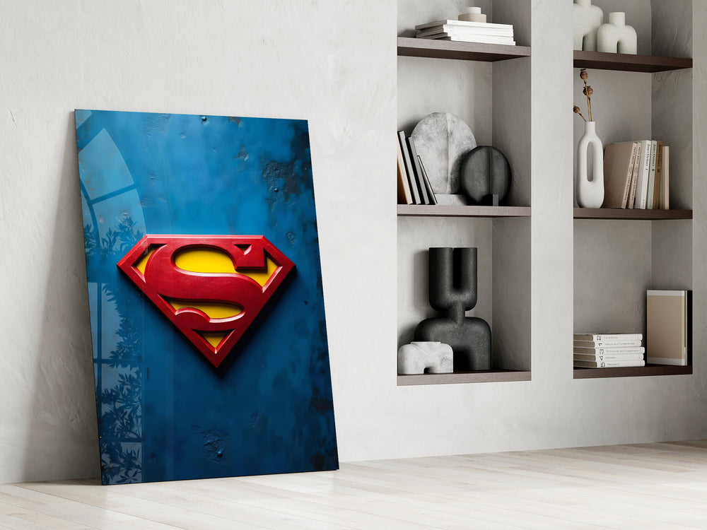 Superman shield artwork above a gaming setup with ambient light