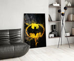Yellow Batman panel against a moody dark-painted wall