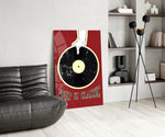 Vinyl record panel against a brick or warm-toned bar wall