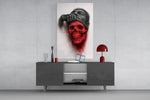 Surreal portrait glass wall art catching light to reveal its drawn texture