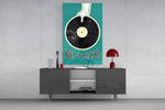 Keep It Classic teal glass wall art catching light to reveal its poster texture