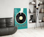 Vinyl record panel anchoring a coastal-café accent wall