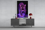 Neon leopard glass wall art catching light to reveal its glowing rosettes