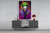 Joker's Chaos glass wall art catching light to reveal its splatter palette