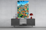 Hillside houses glass wall art catching light to reveal its painterly charm