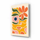 Abstract floral face Matisse-style glass wall art in a modern creative studio