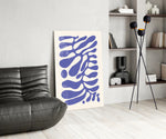 Abstract panel against a soft sand-painted accent wall
