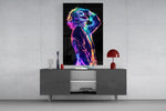 Neon Joker glass wall art catching light to reveal its electric edges