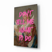 Don't Tell Me What to Do rococo-graffiti glass wall art in a modern women's boutique