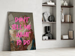 Altered-portrait artwork in a contemporary powder room