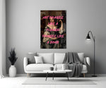 Feminist-graffiti glass print bringing manifesto edge to a master bedroom